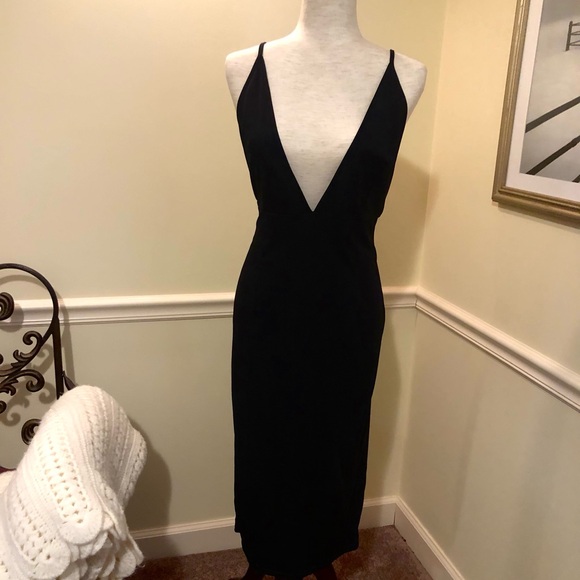 Super Sexy Little Black Dress with a deep plunge. - Picture 1 of 4